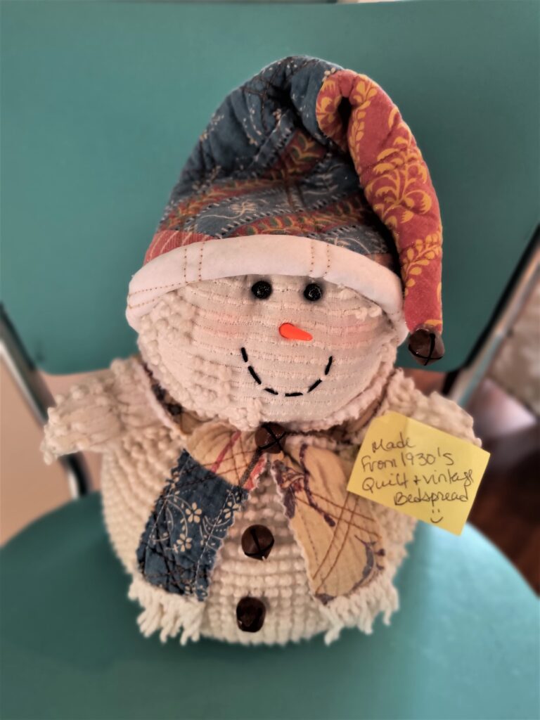 snowman made from vintage quilt