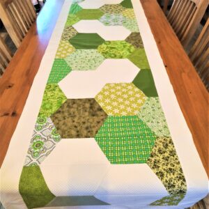 green and white hexagon table runner