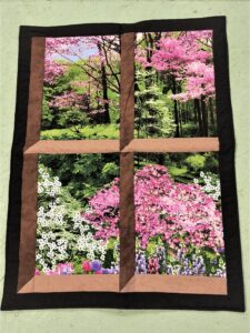 quilt panel made into a window wall hanging