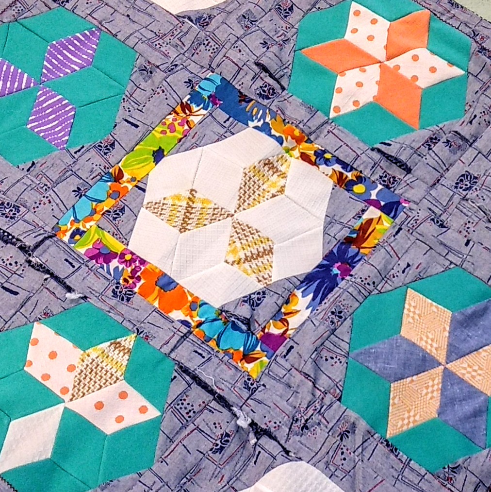 scrappy quilt using cut up clothes