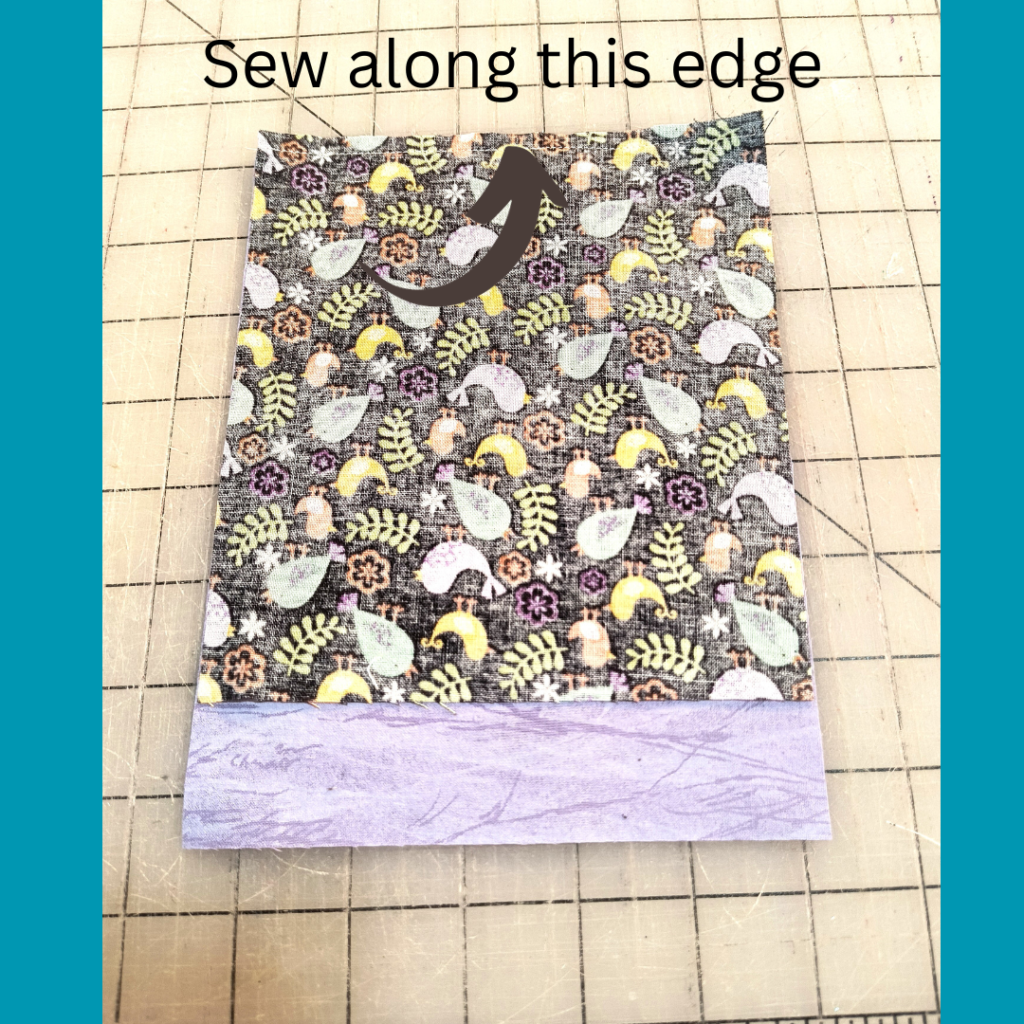 place fabrics right sides together and sew along short edge.