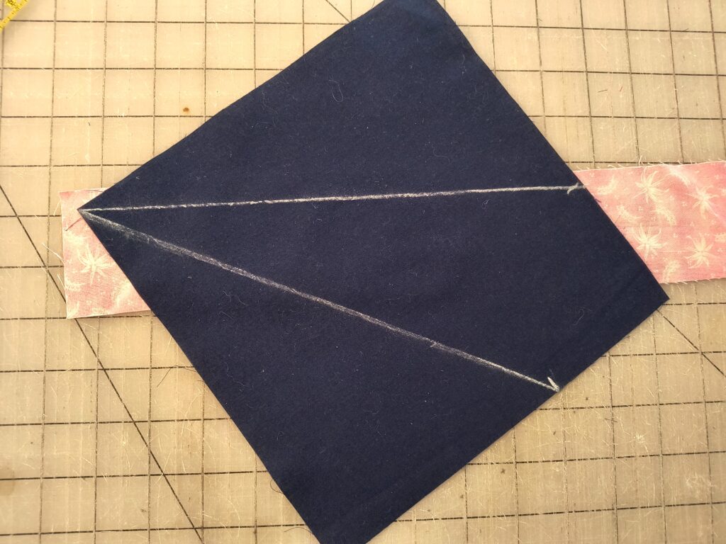 Placement of the string on the block preparing to sew.