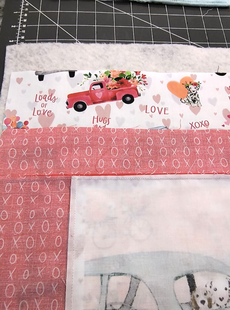 shows placement of fabric and batting to get ready to sew.